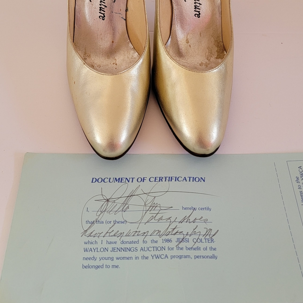 Loretta lynn double signed stage shoes with coa also signed by her.